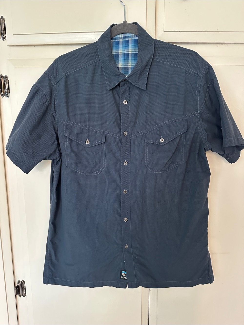 Kuhl Men's Short-Sleeve Button-Down Shirt in Navy with Plaid Lining - Picture 1 of 10